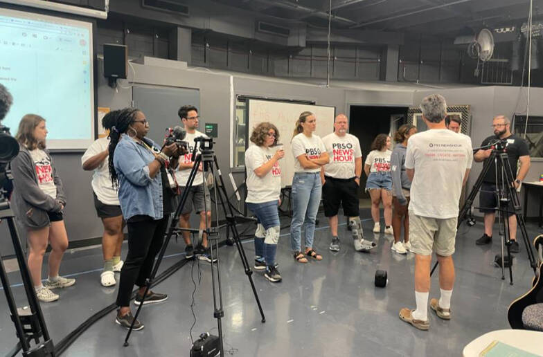 Photo of Students Gathered In studio